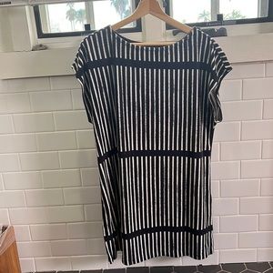 Adorable nautical type dress. Black and white stripes.